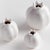 Simple and sweet, this set of three bud vases are pomegranateinspired. They make the perfect little accent for side table,...