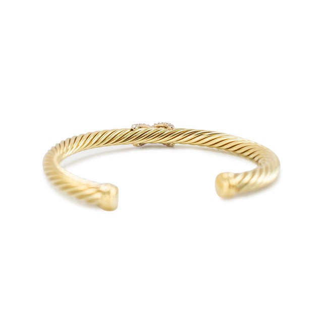 Brand: David Yurman Gender: Ladies Metal Type: 14K Yellow Gold Length: 6.25 mm Width: 6.00 mm Weight: 14.06 grams DAVID...