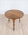 A charming 18th century pine cricket table featuring a classic triangular top and elegant tripod base characteristic of...