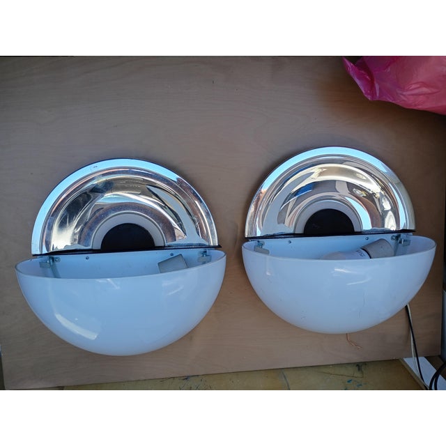 this pair of soncesare large they are12" l by11" w with" the bottom glass cup provides the lite for the silver plated top...
