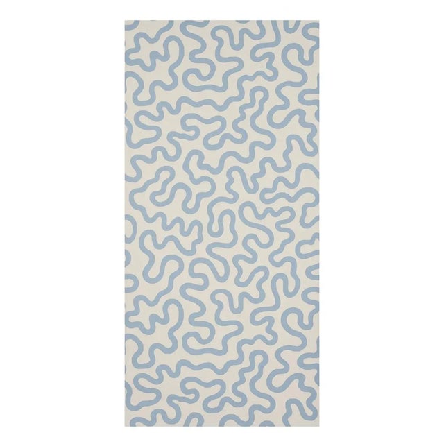 A fun modern take on a classic vermicelli pattern, Riley features a graphic meandering motif printed in opaque ink on a...
