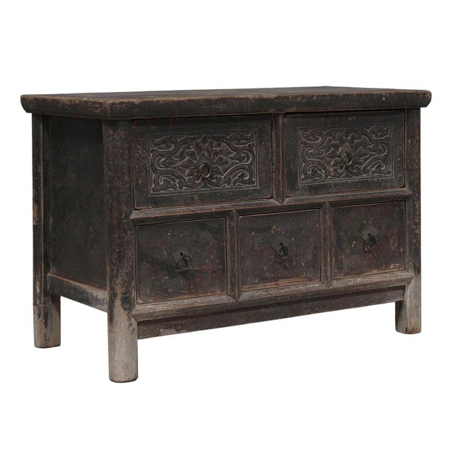 This vintage accent chest is made from reclaimed solid wood with a weathered, dark brown finish. The low profile frame...