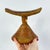 Ethiopian headrests come in various forms. They range from simple to elaborately carved artifacts. They have abstract...