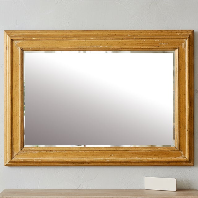 The rustic oak stripped oak wormwood wall mirror exudes a charming and timeless French country farmhouse appeal with its...