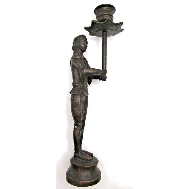 Pair of Vintage Cast Bronze Siamese Soldier Candle Holders Each measures 2 1/4" wide, 3 1/2" deep and 11" tall. Each will...