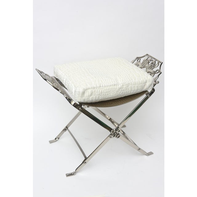 This fantastic period vintage Art deco bench has wonderful griffins and and gargoyles at either end. It is labeled Verona....