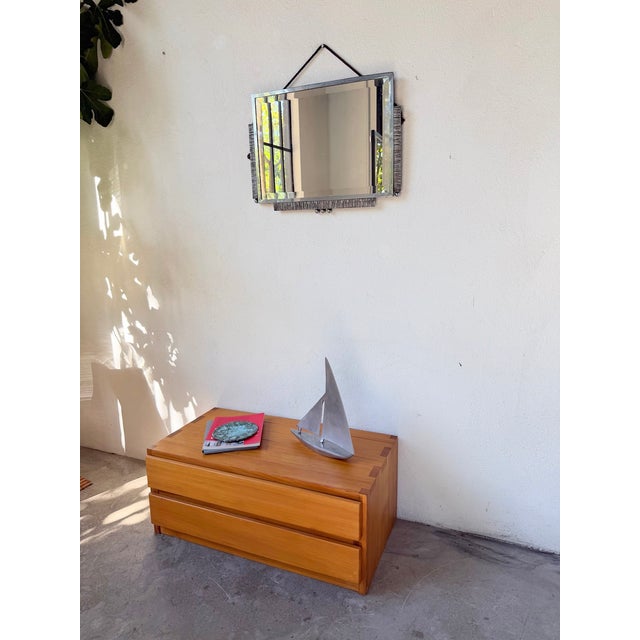 Antique silver-plated metal mirror from the 1930s in the art deco style. a very attractive rectangular frame, adorned with...