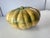 A harvest style lidded dish of a squash. This piece is beautifully glazed with lifelike color variations. Add this to a...