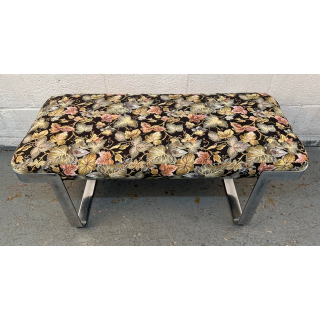 Iconic mid-century sophistication to your space with this elegant Milo Baughman-style bench. Featuring a sleek polished...