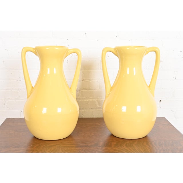 A gorgeous pair of Arts & Crafts large glazed handled art pottery jugs or vases By Roseville Pottery USA, 1930s Glazed...