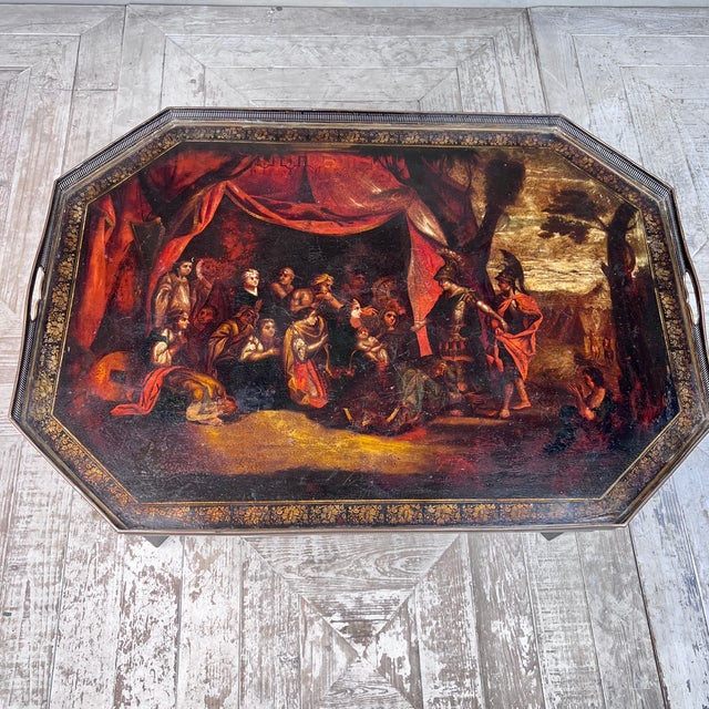 The large octagonal tray finely hand-painted with The Family of Darius before Alexander the Great, depicting Alexander and...