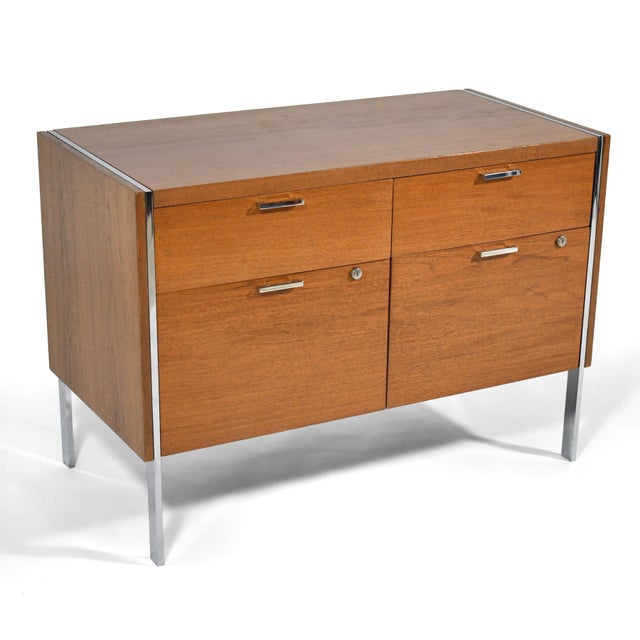 This handsome credenza by Stow Davis is extremely well built and chock full of pleasing details including flat stock legs...