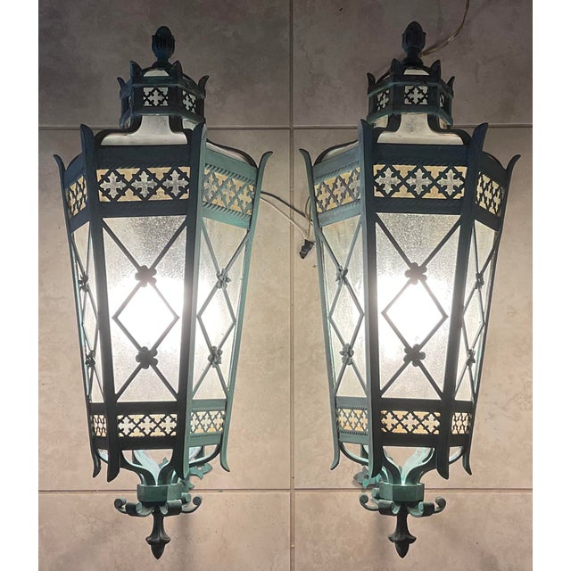 These stunning vintage wall sconces are crafted from solid brass and feature a beautiful patina finish and art glass...