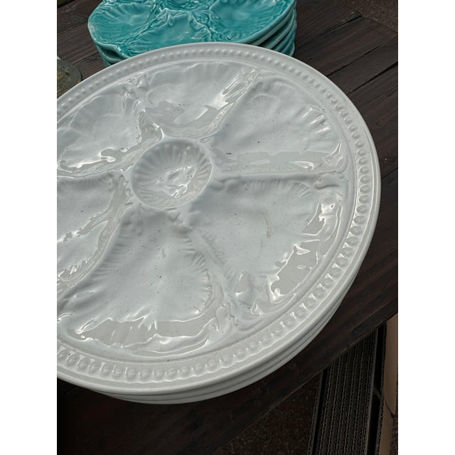 Set of six Gien creamware oyster plates with a beaded boarder. Makers mark on underside. 9.8” dia 44-005