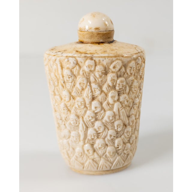 Mid 20th Century Chinese Carved Cow Bone Snuff Bottle With 100 Faces Design For Sale - Image 4 of 12