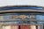 Beautiful French Louis XV-style vitrine display cabinet dating to circa 1940s, featuring an elegant curved silhouette,...