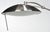 modern, arched curved stand with disk shaped shade, black marble base, approximately 78 in,, Provenance: Private...
