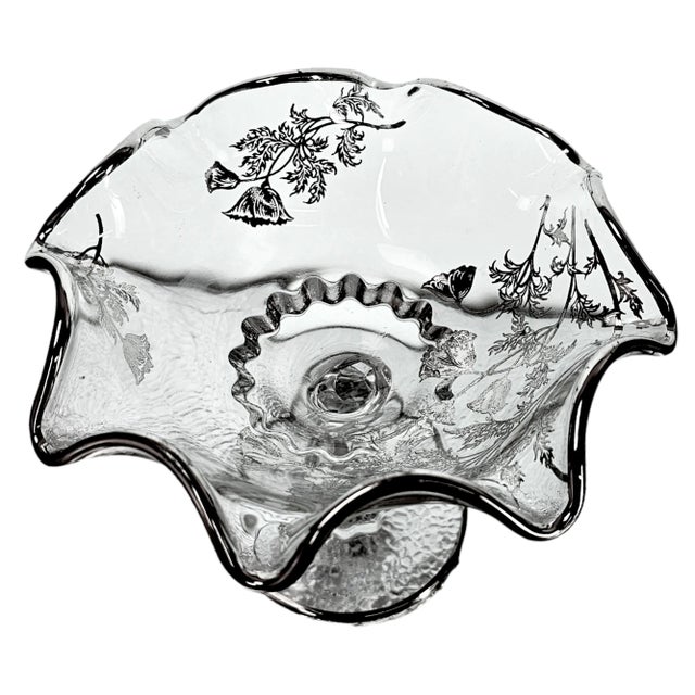 Beautiful ruffled pedestal bowl, Floral Silver Flowers are applied to glass. This dish was kept in plastic for six decades...