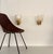 Beautiful set of two brass wall lamps made of strong brass base and light amber colored murano glasses with real golden...