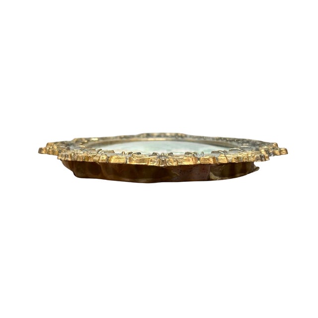 This charming vintage Italian oval picture frame features an ornate Florentine-inspired design with scrolling acanthus...