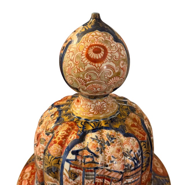 A striking late 19th century Japanese Imari porcelain floor vase, masterfully hand decorated and fully signed on the...