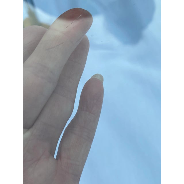 Vintage tubular chrome end/side tables with glass tops. Shiny chrome base is sturdy yet light weight. Glass sets in prong...