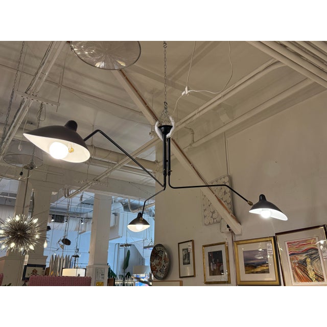 Design Plus Gallery presents a Ceiling Lamp from Serge Mouille. Simple and elegant, this ceiling lamp makes a dramatic...