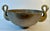 A Very heavy French Art Deco bronze bowl resting on a small cylindrical foot with Swan Handles flanking either side. The...