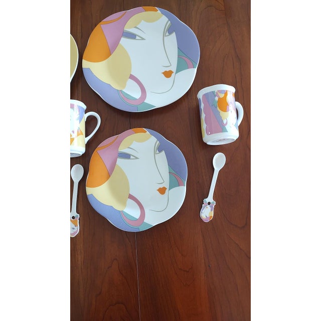 Three 1980's place settings from the Larry Lasso Collection "Visage". This is a fun and vibrant set of dishes. Each place...