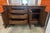 This is a vintage Henredon buffet crafted in rich walnut with a warm, medium-dark finish. The piece features elegant...
