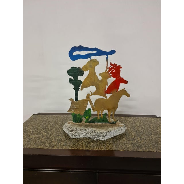 Sculpture created by master Ezio Gribaudo. Unique untitled work in enamelled antimony alloy and stone base. The work...