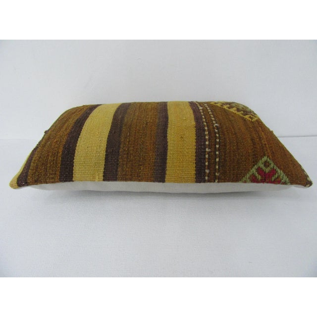 Handmade decorative pillow cover made from a vintage Turkish kilim rug. Backed with good quality cotton fabric. Pillow...