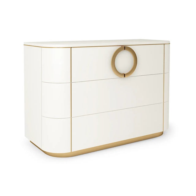 The Maddalena dresser features three spacious drawers and sinuous lines which are elegantly enriched with brass – or...