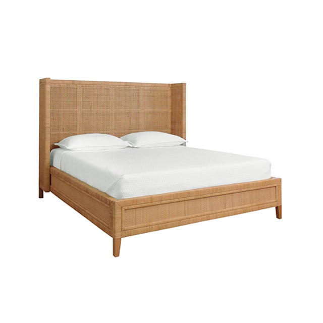 Winged headboard and platform bed in radio weaved wrapped rattan. Queen size. *Wood & Rattan have natural variations and...