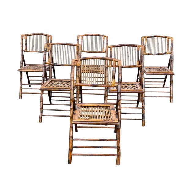 Pre owned set of 6 tortoiseshell bamboo folding chairs. These chairs are perfect for the holidays or hosting a bbq. Pull...