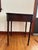 Bring a touch of historic Boston elegance into your home with this exceptional Federal-style mahogany side table from the...