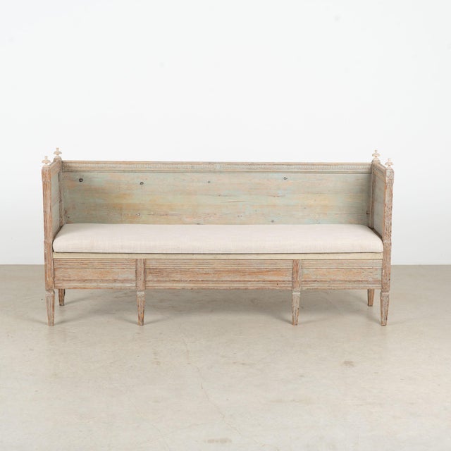 Early 19th century Swedish Gustavian narrow bench, crafted in pine with a highly distressed original painted finish....