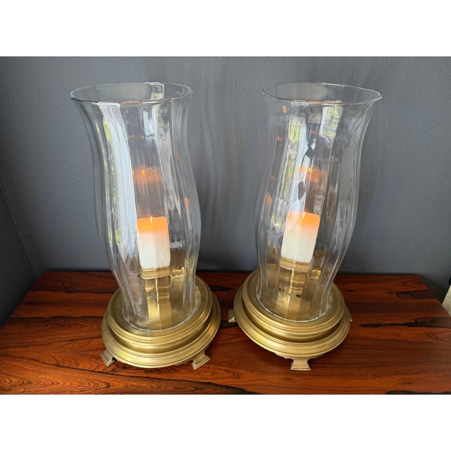 Pair of elegant and impressive brass and crystal hurricanes by Chapman. Crystal hurricanes are not original. They are made...