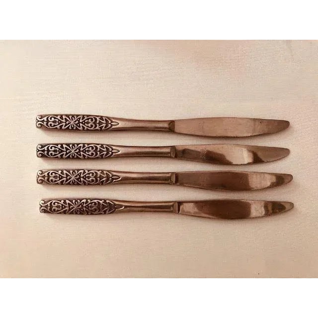 Midcentury Set of 4 Stainless Dinner Knives, Makers mark reads " National Stainless KOREA " In Valinda Pattern . Very good...