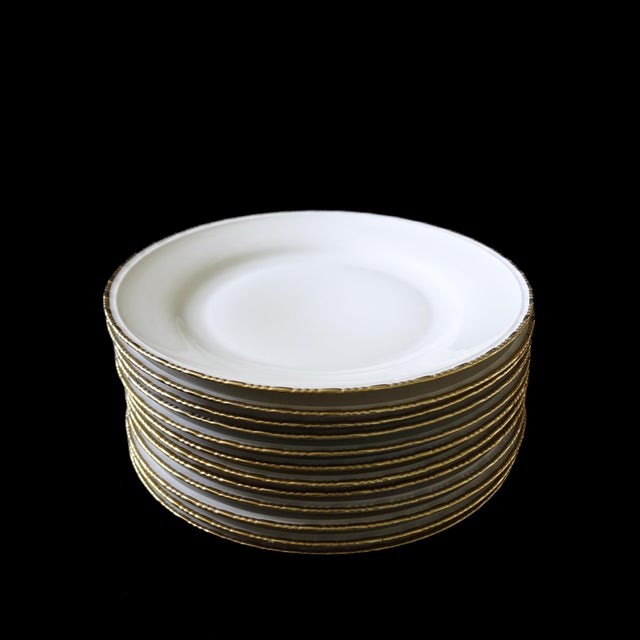 Vintage tableware from Rörstrand 68 with gold ribbon from Sweden mid-century. Large dining plate. The largest of the three...