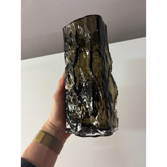 This unique flower vase, known as the Bark Vase, was designed by the renowned Danish fashion designer Margit Brandt....