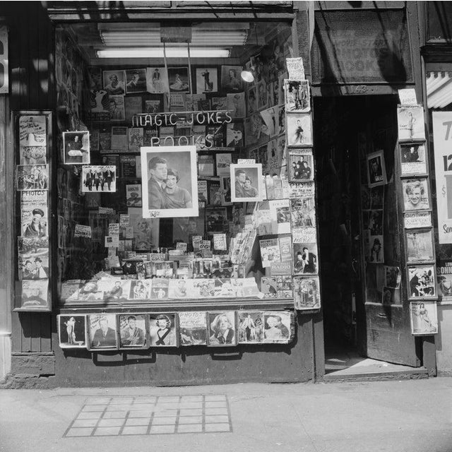 Magic And Jokes For Sale A magic, joke and book shop in New York City, 1964. In the window are portraits for sale of...