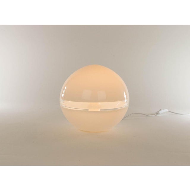 White lt 230 table lamp designed by carlo nason and manufactured in the 1970s by murano glassmaker a.v. Mazzega. the lamp...