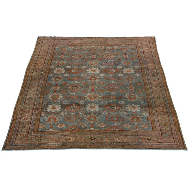 Beautiful antique Malayer hand-knotted wool rug with a blue color field. This Persian rug has a gorgeous all-over design...