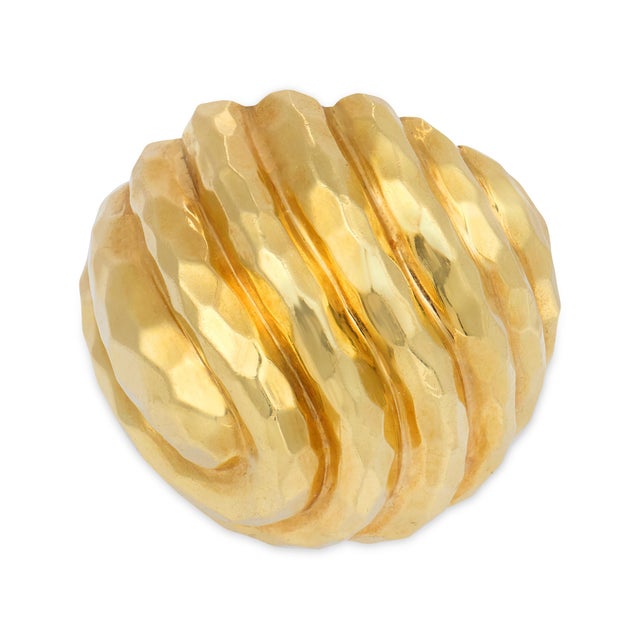 This bold vintage ring by Henry Dunay showcases the designer’s iconic hammered finish, creating a rich, tactile surface...