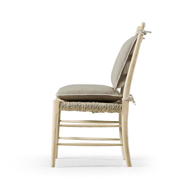 This chair boasts a robust oatmeal stripped oak finish to the frame that reveals the exquisite natural grain and charm of...