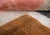 A bold burnt sienna border frames a nested composition of ivory, honey ginger, and charcoal blocks — architectural,...
