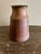 Stunning vase Beautifully glazed Signed Calder Measures: 7 1/2" tall Diameter at base is 5 3/4" and 3 1/2" wide at the top...