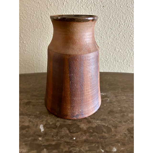 Stunning vase Beautifully glazed Signed Calder Measures: 7 1/2" tall Diameter at base is 5 3/4" and 3 1/2" wide at the top...