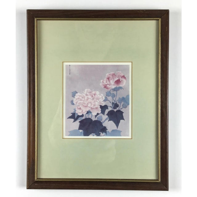 Nicely framed and matted pair of complementary prints featuring botanicals with an Asian theme. Glass protection and ready...